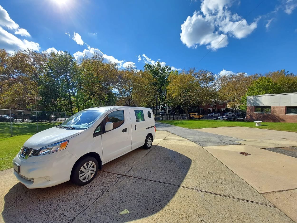 SteamVacGreen work van parked outside